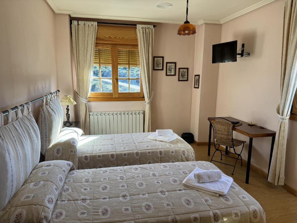 Postel nebo postele na pokoji v ubytování Hotel Pico Espiguete