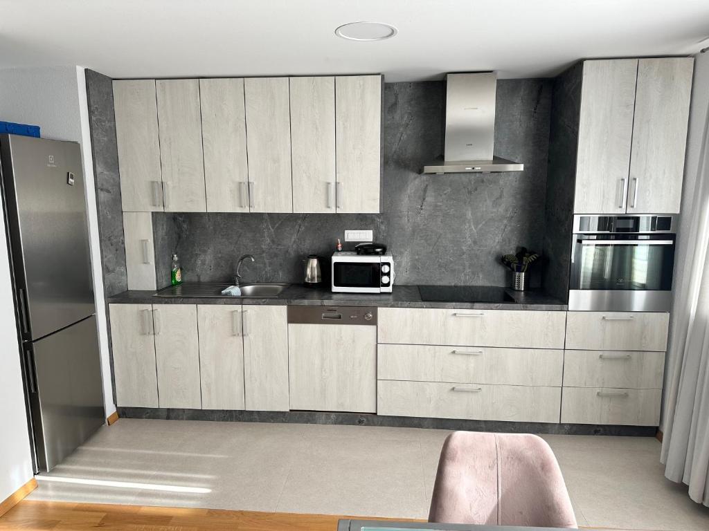 Kuchyňa alebo kuchynka v ubytovaní Apartman PEPI