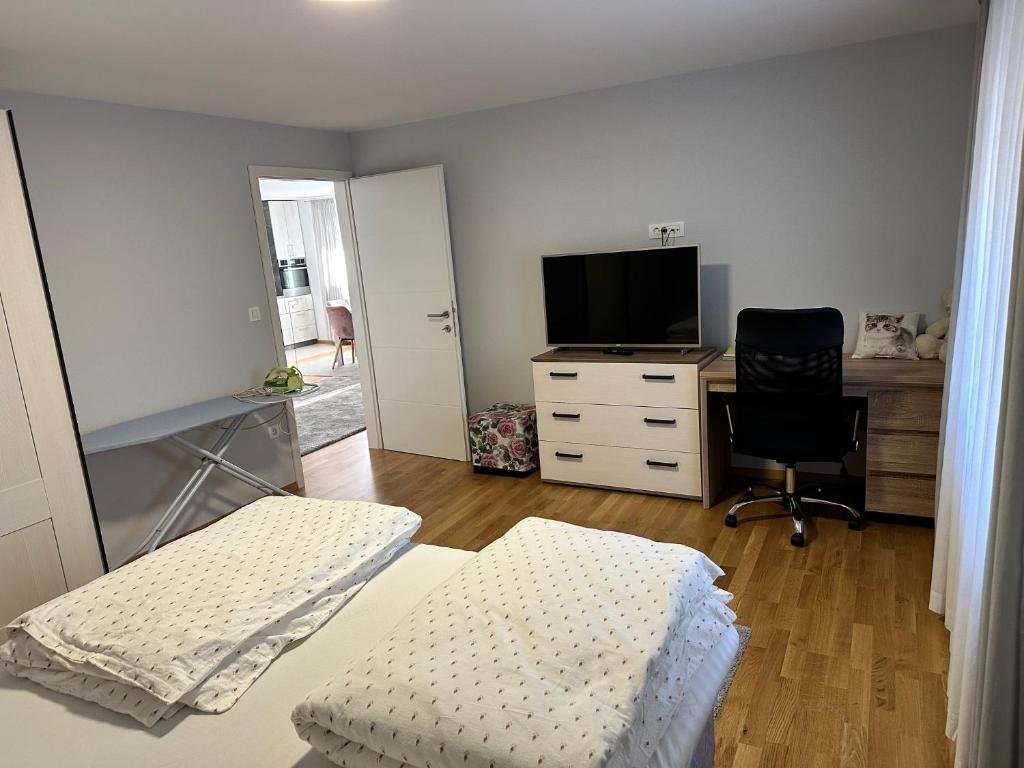 Posteľ alebo postele v izbe v ubytovaní Apartman PEPI
