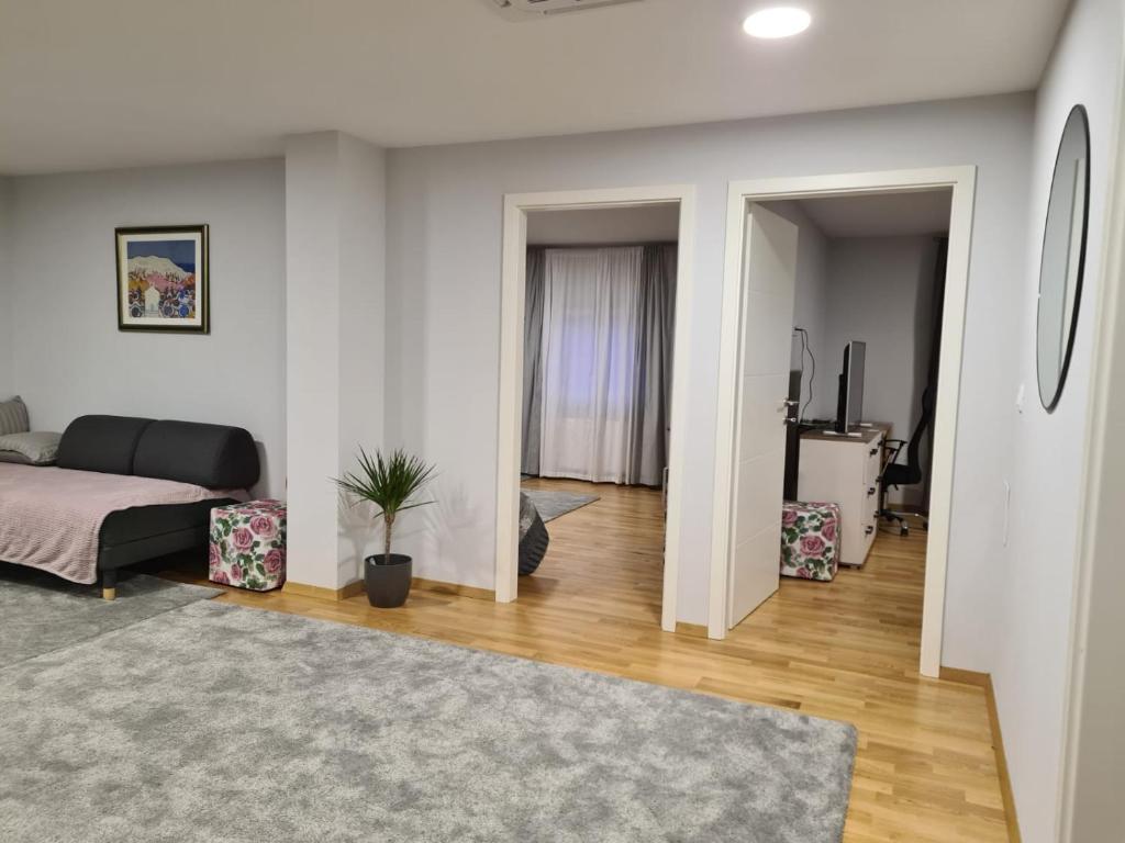 Posteľ alebo postele v izbe v ubytovaní Apartman PEPI