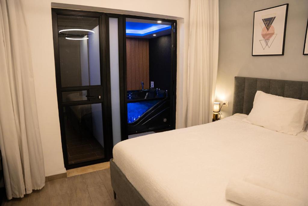 Postel nebo postele na pokoji v ubytování צימר אדל - Zimmer Adel