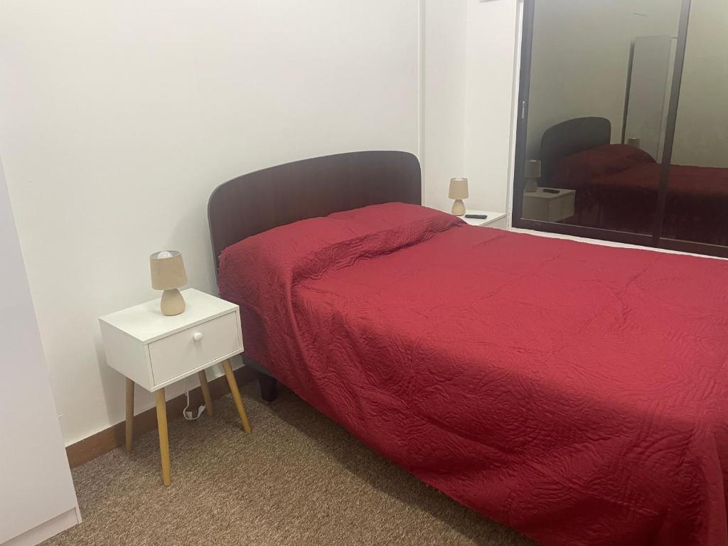 Postel nebo postele na pokoji v ubytování Hostal EntreOrientes
