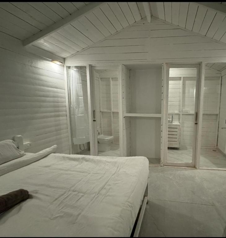 Tempat tidur dalam kamar di Palolem Beach View Inn