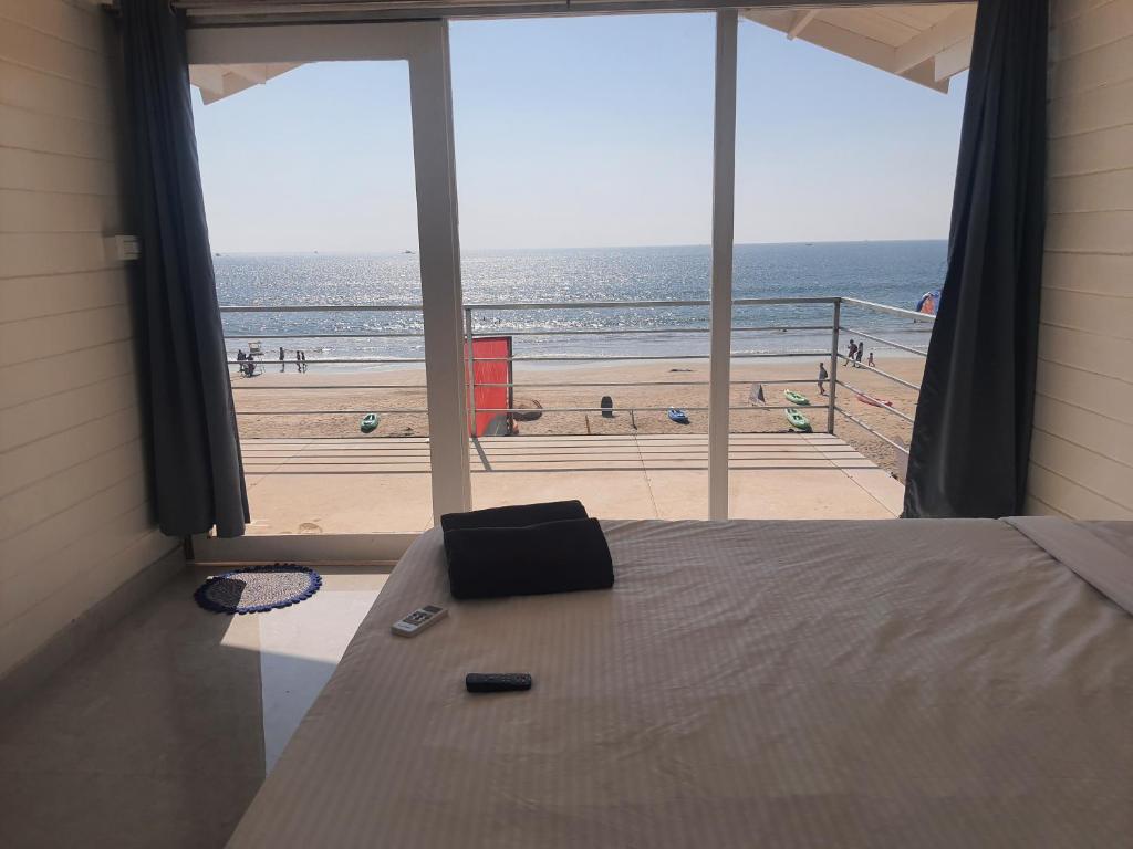 Tempat tidur dalam kamar di Palolem Beach View Inn