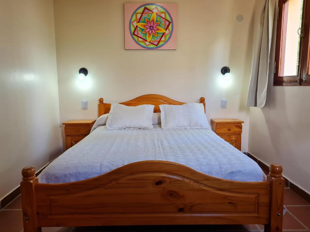 Postel nebo postele na pokoji v ubytování Cabañas Jacy