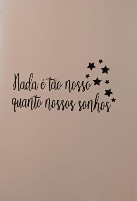 a sign with the words malada and tar novo navaho novoos at Kitnet Vila Marcela 1 in Petrolina