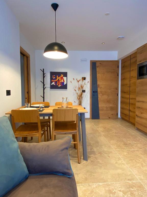 TV a/nebo společenská místnost v ubytování Chalet Larix Andalo Deluxe Apartments