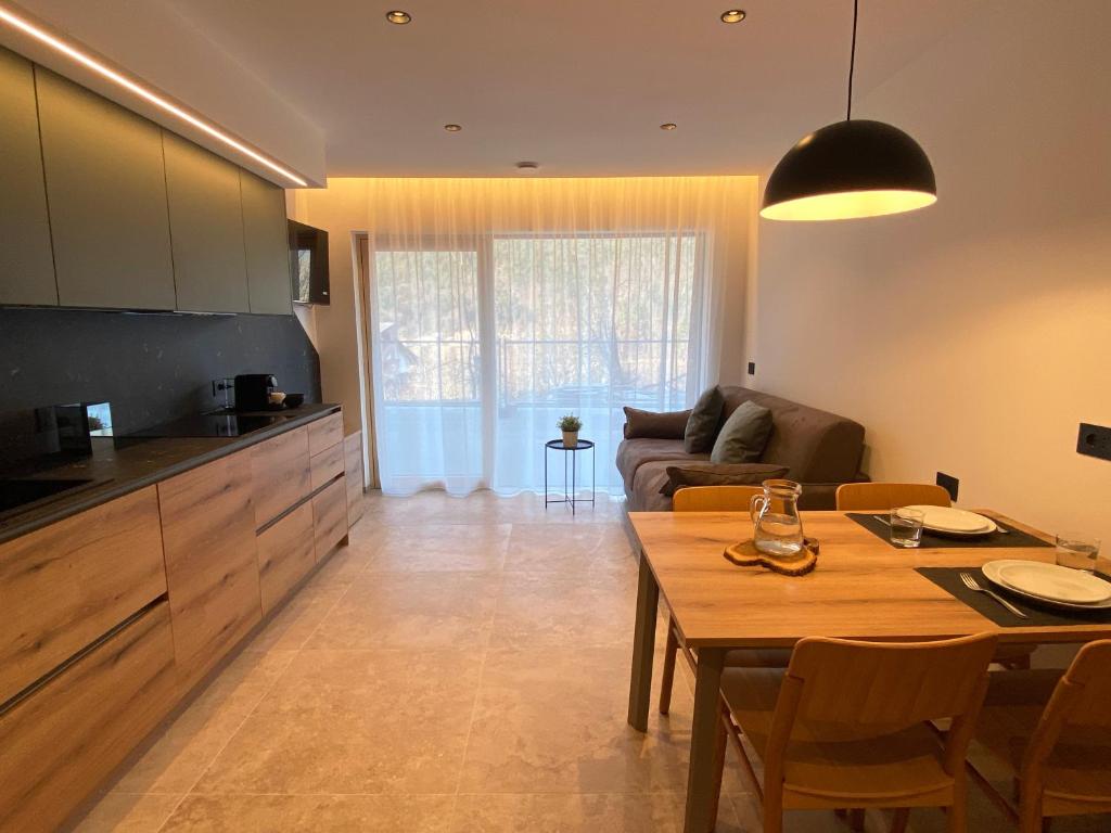 Kuchyň nebo kuchyňský kout v ubytování Chalet Larix Andalo Deluxe Apartments