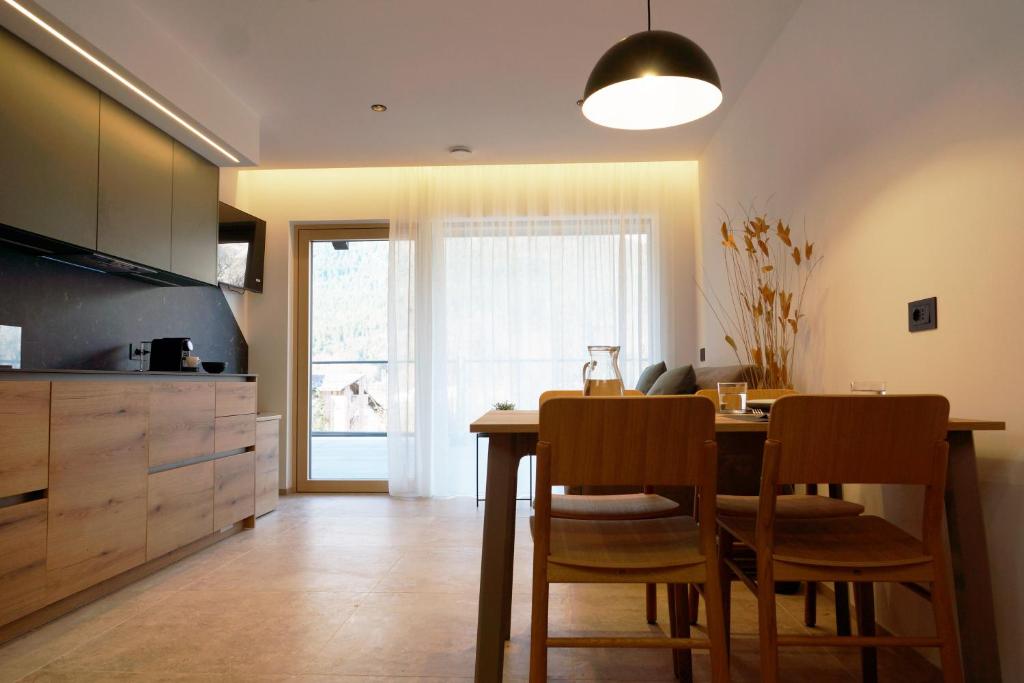 Kuchyň nebo kuchyňský kout v ubytování Chalet Larix Andalo Deluxe Apartments