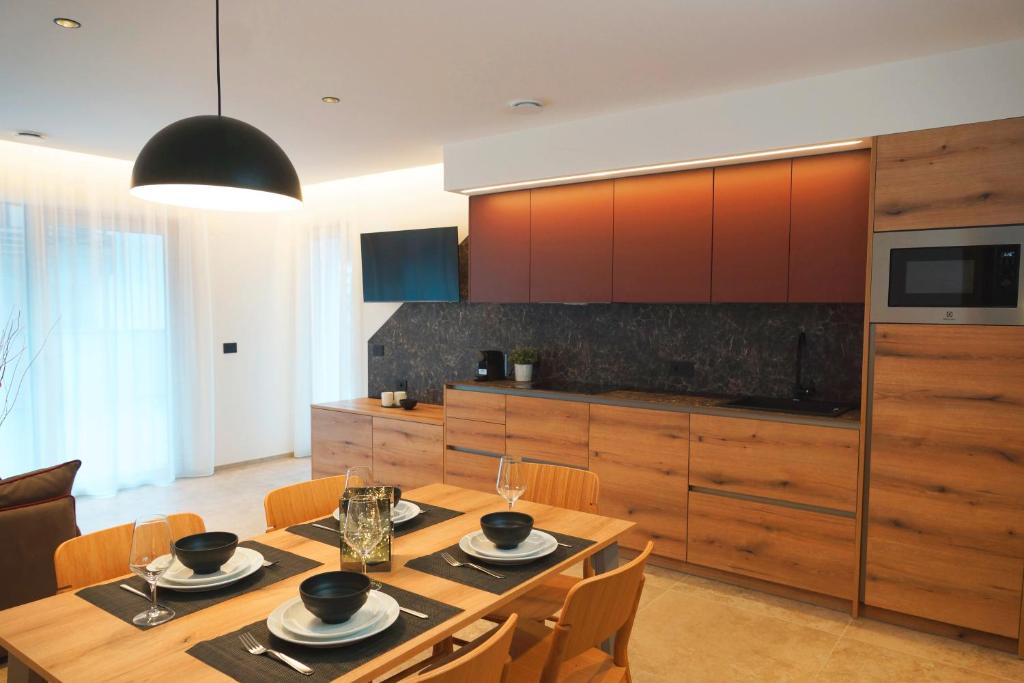 Kuchyň nebo kuchyňský kout v ubytování Chalet Larix Andalo Deluxe Apartments