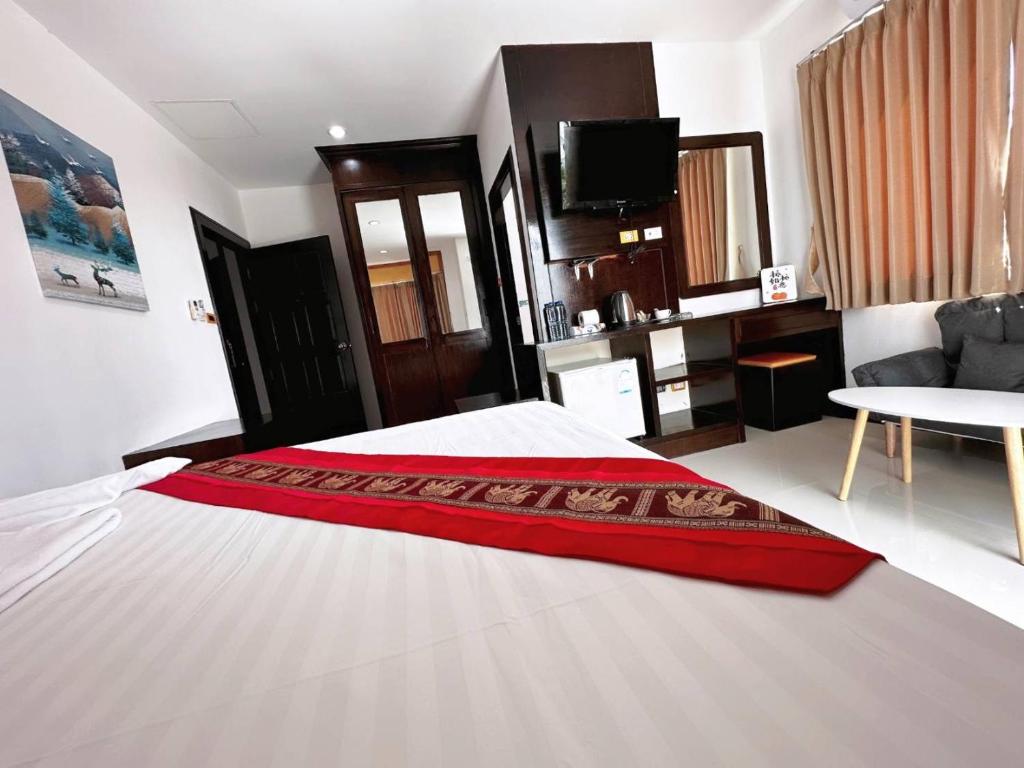 Postel nebo postele na pokoji v ubytování Abby's House Hotel