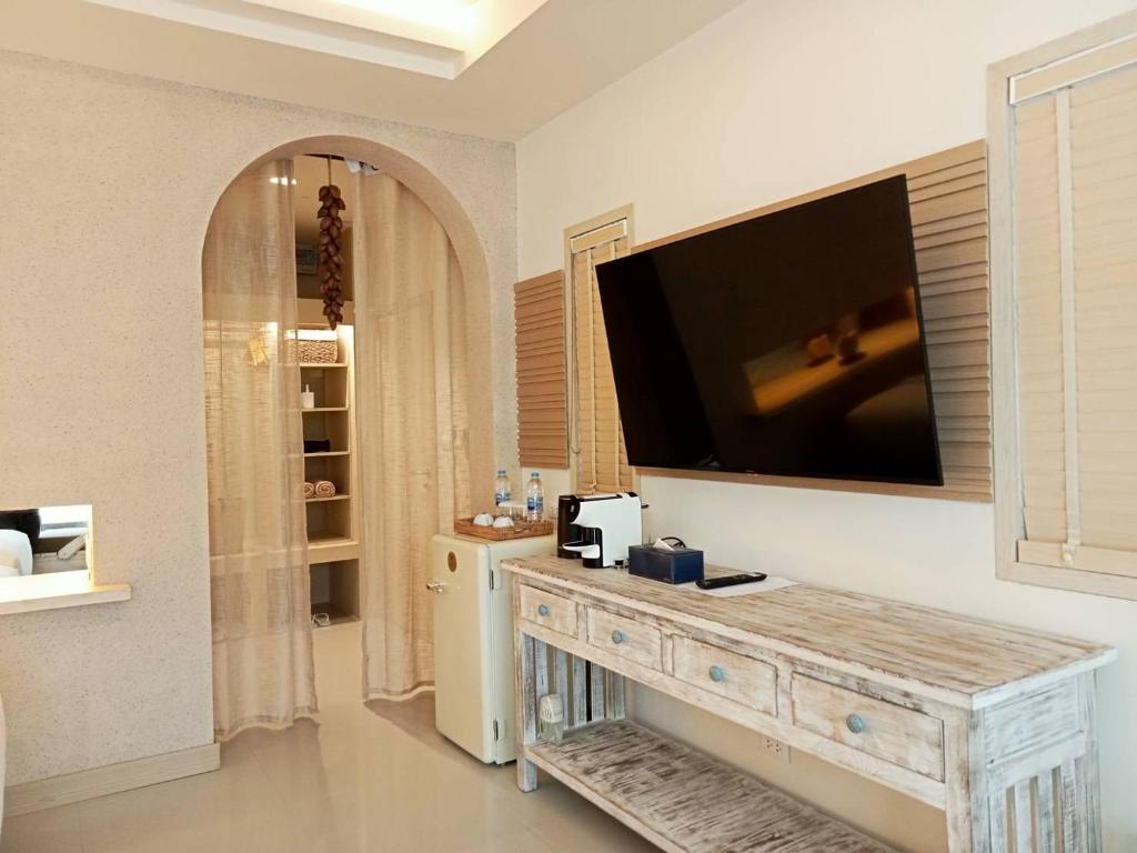 TV a/nebo společenská místnost v ubytování Amity Beach Resort