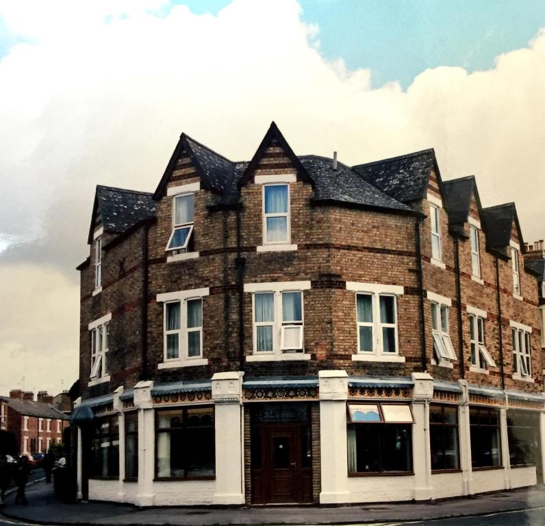 an old building on the corner of a street at The Jericho Hotel in Oxford