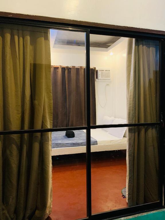 Postel nebo postele na pokoji v ubytování Dadods homestay