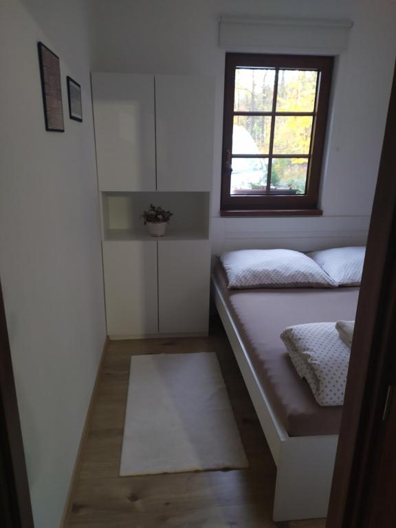 Postel nebo postele na pokoji v ubytování Na paloučku