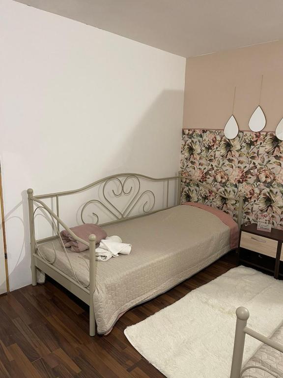 Postel nebo postele na pokoji v ubytování Μεζονέτα 100τμ επί της Λ.Ευελπιδων στη Βάρη