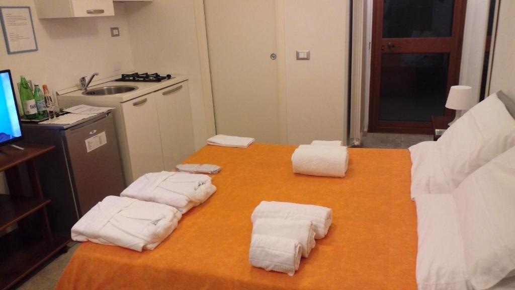 Łóżko lub łóżka w pokoju w obiekcie Cinque Terre Tra Il Filo Di Arianna
