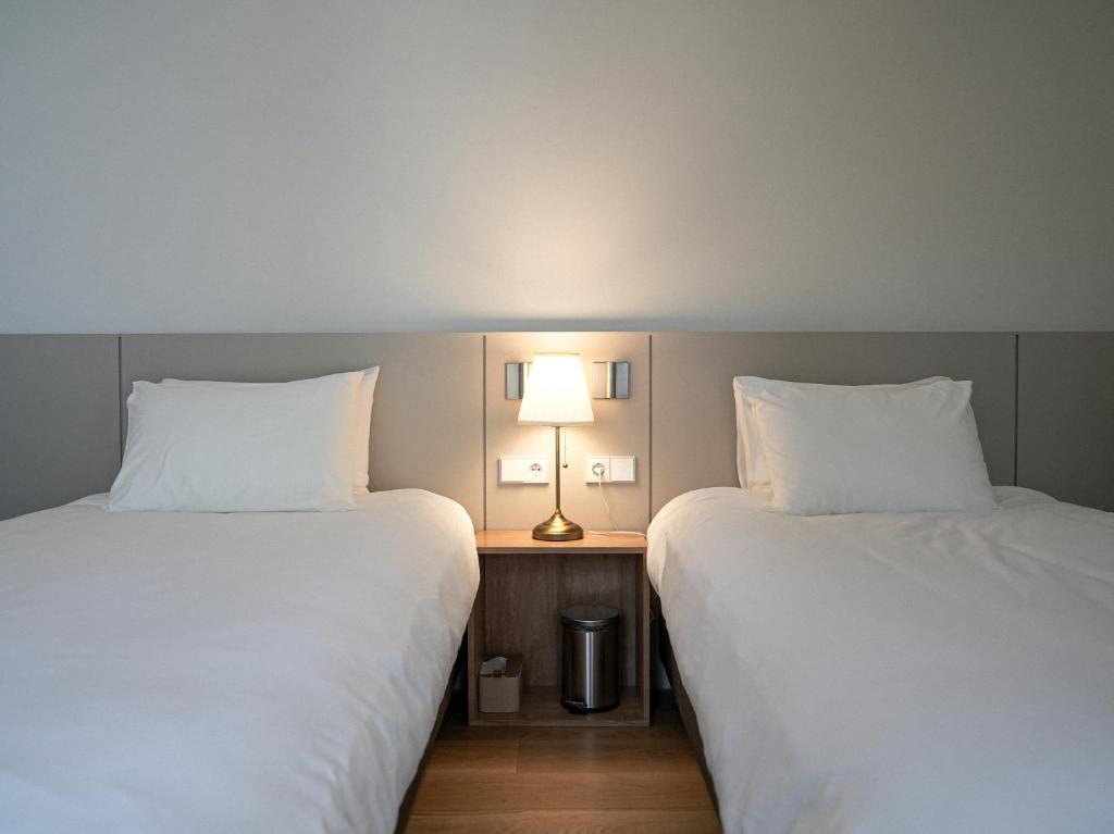 Ένα ή περισσότερα κρεβάτια σε δωμάτιο στο Mokha forest house