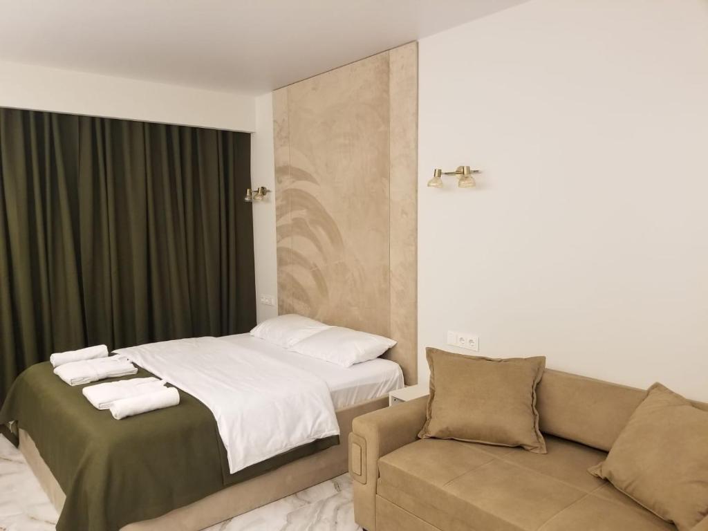 Postel nebo postele na pokoji v ubytování Segreto apartment 309, 311, 341