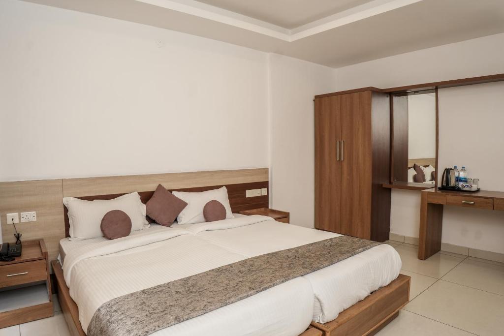 Postel nebo postele na pokoji v ubytování HOTEL LETS STAY