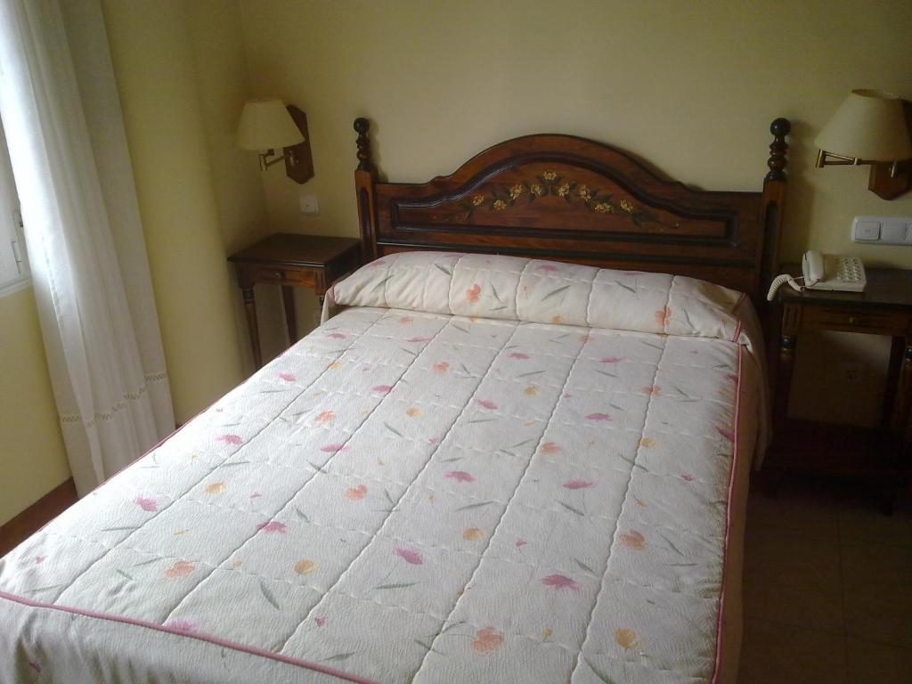 Posteľ alebo postele v izbe v ubytovaní Hotel Cortijo