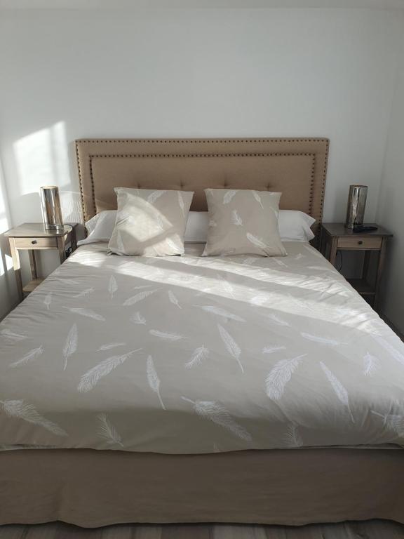 Ένα ή περισσότερα κρεβάτια σε δωμάτιο στο STUDIO L'HORIZON