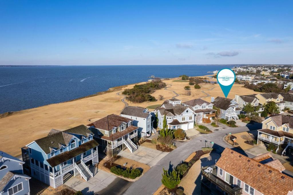 an aerial view of a town with a hot air balloon at MS15 Sound View in Nags Head