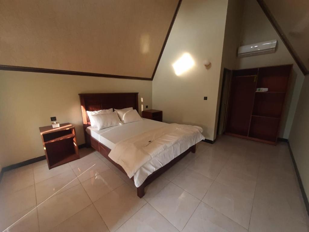 Postel nebo postele na pokoji v ubytování Kaliningrat Cottage 1