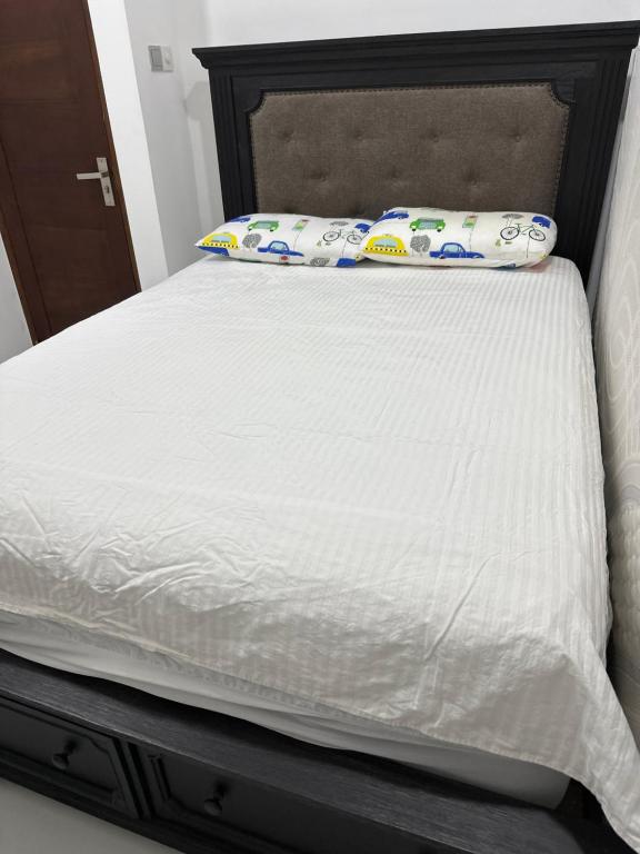 Llit o llits en una habitació de Mode apartment non ac room