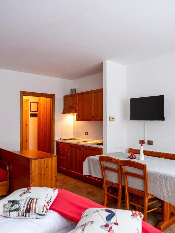 Postel nebo postele na pokoji v ubytování Residence Monterosa