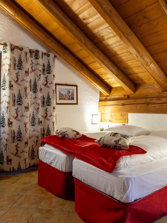 Postel nebo postele na pokoji v ubytování Residence Monterosa