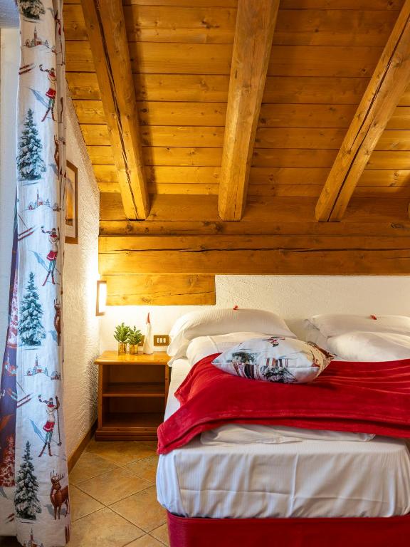 Postel nebo postele na pokoji v ubytování Residence Monterosa
