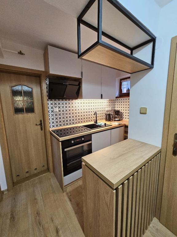 Kuchyň nebo kuchyňský kout v ubytování Family House - Apartmany Zuzana