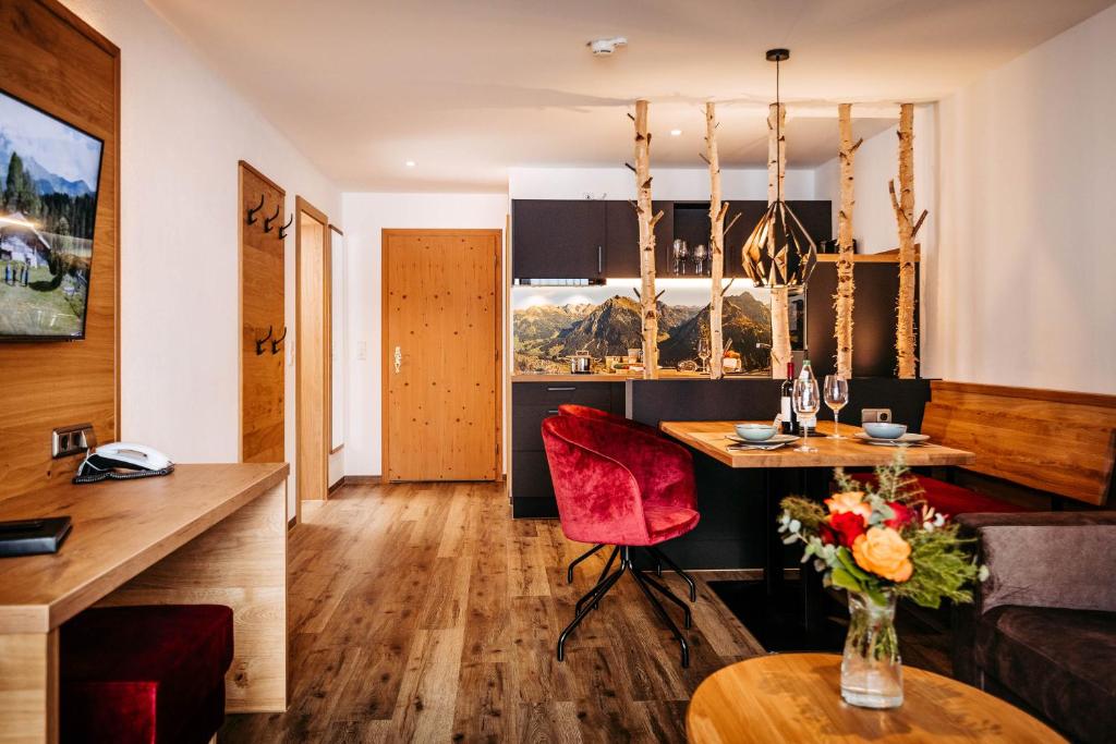 TV a/nebo společenská místnost v ubytování Hotel Alpenstüble Appartements