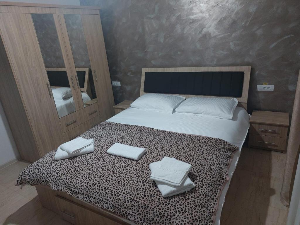 Postel nebo postele na pokoji v ubytování Pensiunea Alexandra