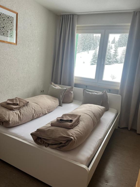Postel nebo postele na pokoji v ubytování Berggasthof zur Todtnauer Hütte