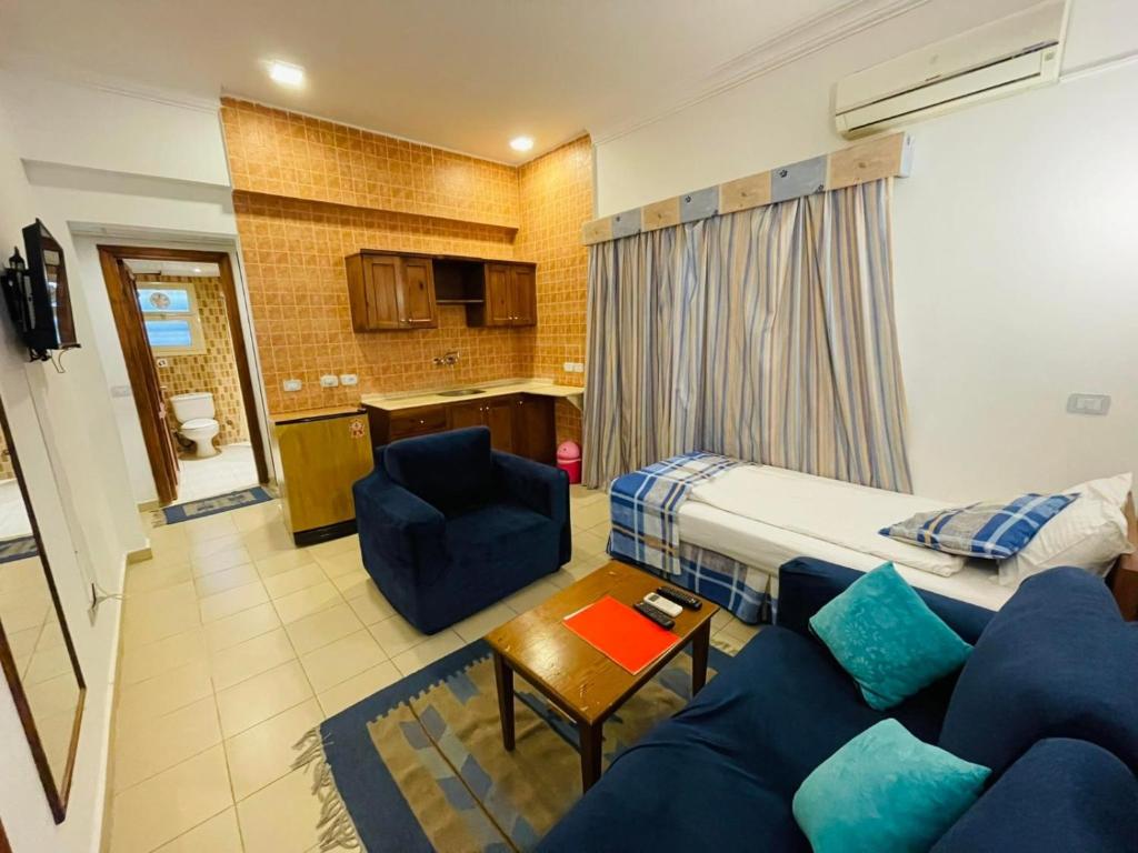 Postel nebo postele na pokoji v ubytování 4S Hotel Dahab