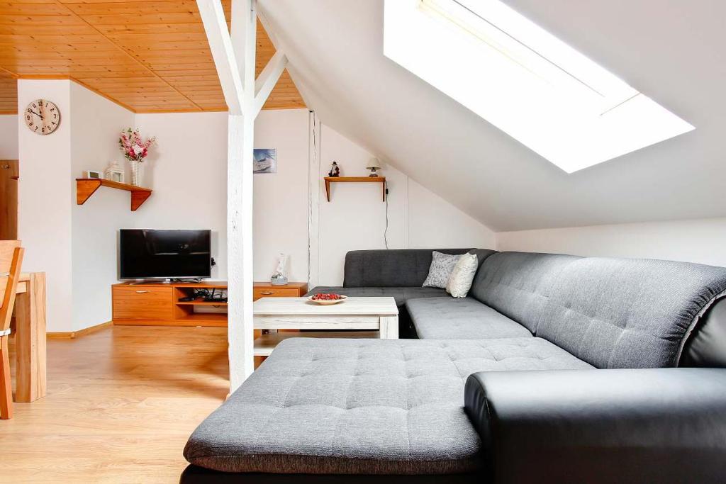 Posezení v ubytování APARTMÁN U MAXÍKŮ