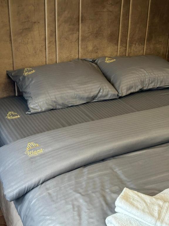 Postel nebo postele na pokoji v ubytování Mans lux 8 Apartman