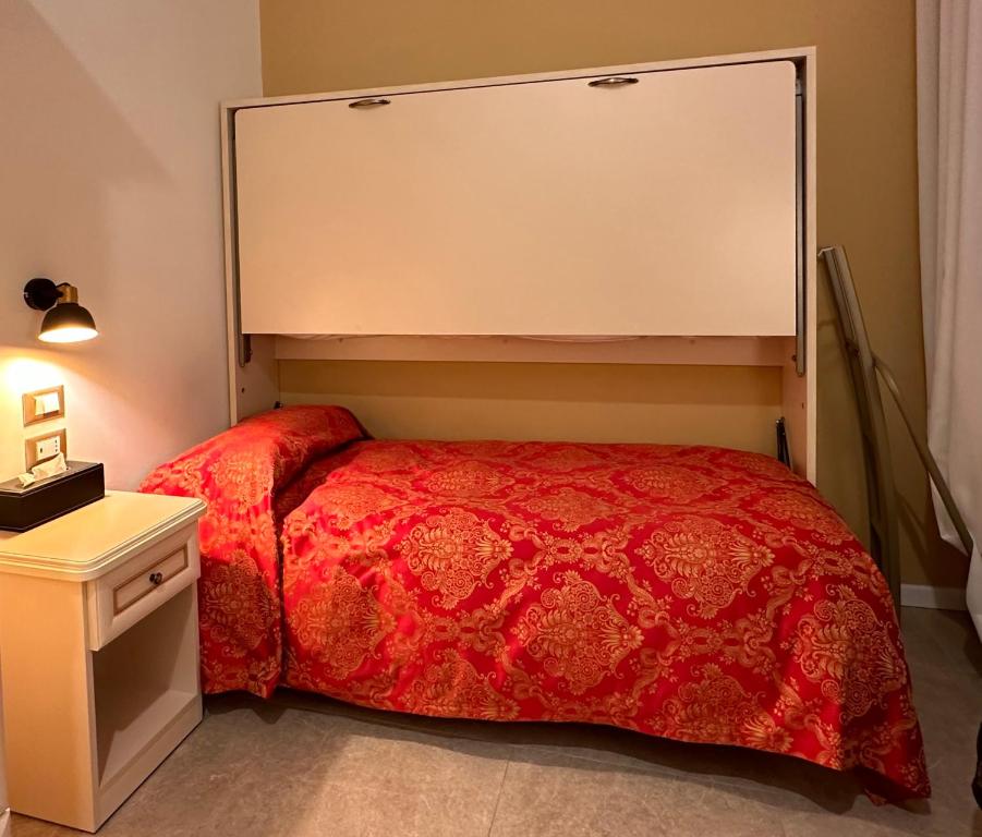Postel nebo postele na pokoji v ubytování Collegio AMDG