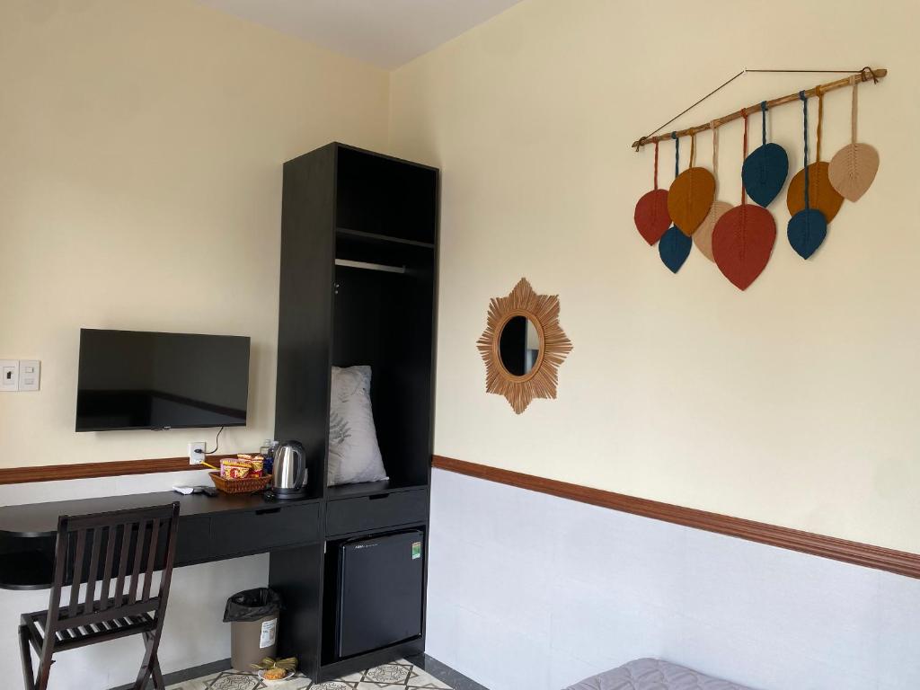 TV a/nebo společenská místnost v ubytování SAM HOMESTAY HUE