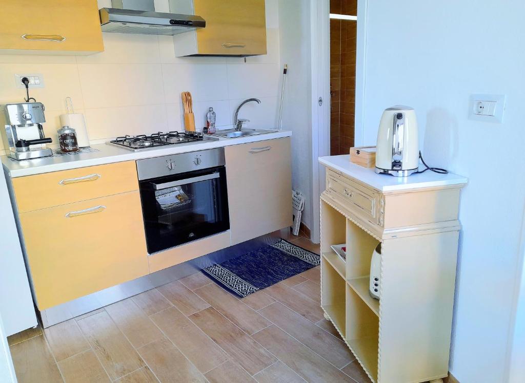 Kuchyň nebo kuchyňský kout v ubytování casa vacanze gioema baunei