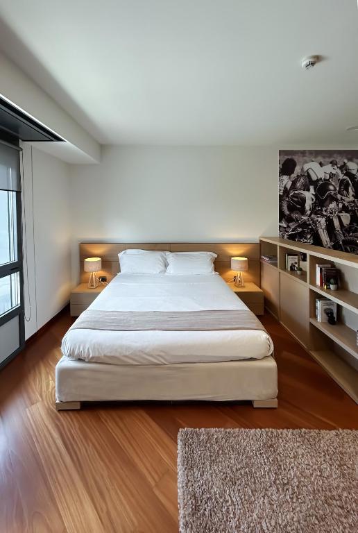 เตียงในห้องที่ CasaMia Appartamenti 606