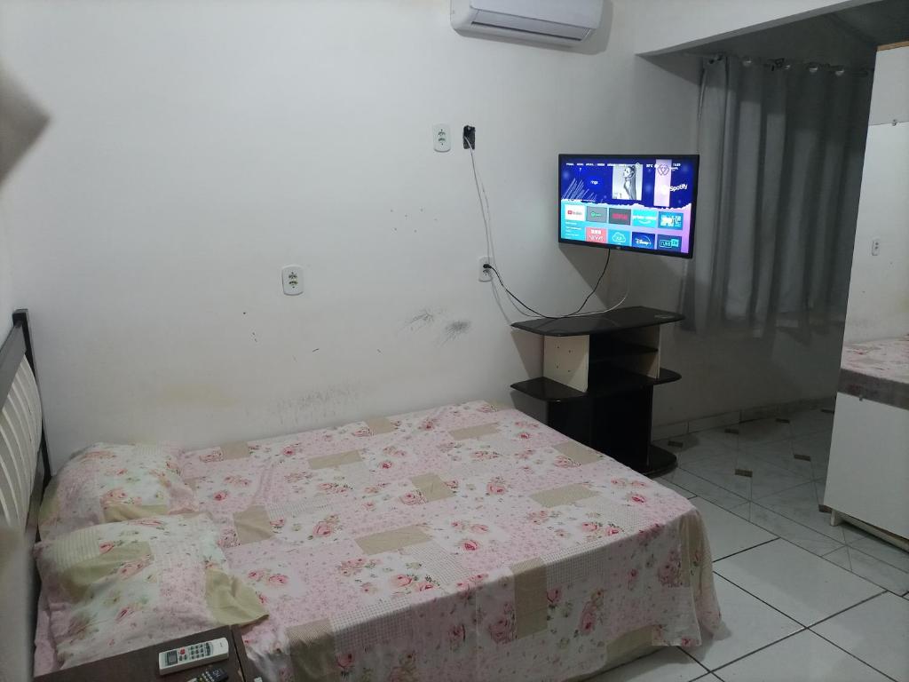 TV a/nebo společenská místnost v ubytování Casa em Guriri para temporada