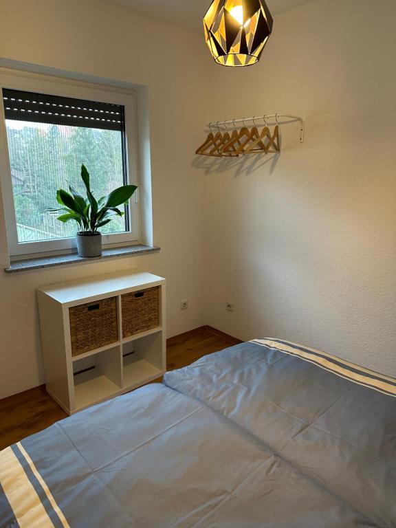 Postel nebo postele na pokoji v ubytování 100m2 5 min zum See Grillecke