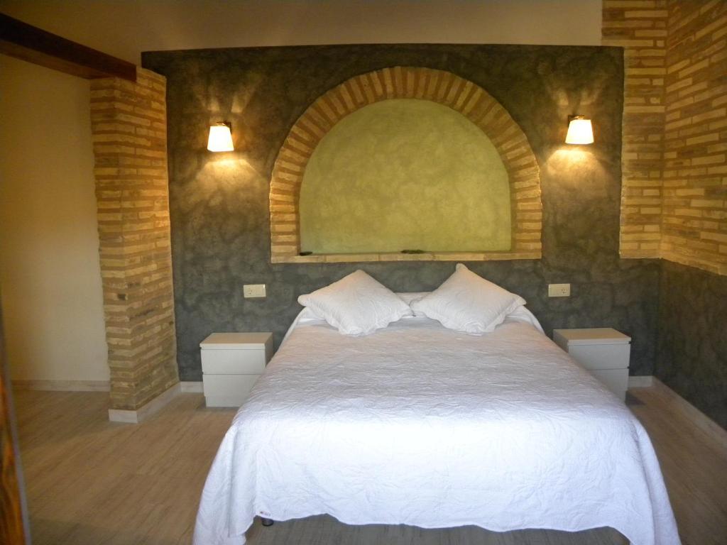 Postel nebo postele na pokoji v ubytování Casa Jabonero