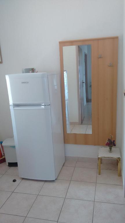 Kuchyň nebo kuchyňský kout v ubytování Apartments Vukas