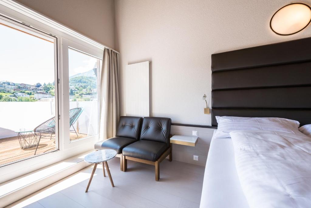 Postel nebo postele na pokoji v ubytování Boutique Hotel Riviera