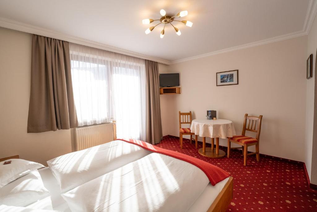 Posteľ alebo postele v izbe v ubytovaní Haus Kössler