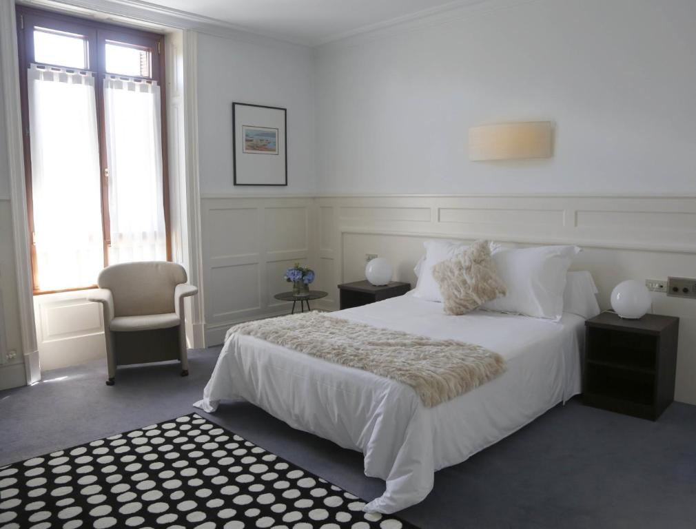 Postel nebo postele na pokoji v ubytování Hotel Olajauregi